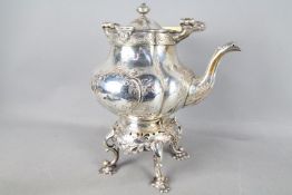 A Victorian electroplated spirit kettle, with ivory swing handle and hinged cover with finial,