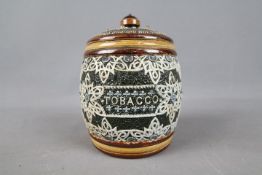 Doulton Lambeth, Doulton & Slaters Patent, a stoneware tobacco jar in the style of Eliza Simmance,