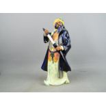 Royal Doulton - a figurine depicting Bluebeard, HN2105 hand painted in blue, purple, orange,