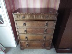 A chest of five graduated drawers,