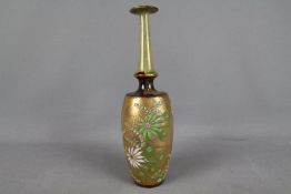 A Doulton Lambeth, Doulton & Slaters Patent stoneware vase, floral decoration to a gilt ground,