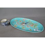 An H.B Choisy-Le-Roi oval plate with bird and insect decoration and an Oriental cup.