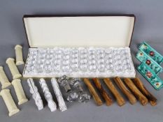A collection of knife rests to include a boxed set of twelve glass examples,