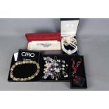 Evening Jewellery - five boxes of evening costume jewellery to include necklaces and earrings