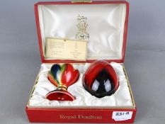 Royal Doulton - the Royal Doulton Flambe Egg with holder issued in a limited edition,