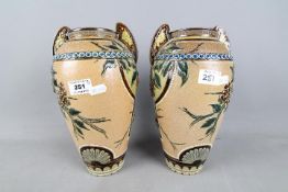 Doulton Lambeth - A pair of late 19th century, twin handled,
