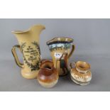 Two Royal Doulton Series Ware jugs including 'Ye Squire Ye Passenger' with hallmarked silver rim,