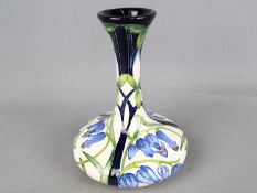 Moorcroft Pottery - a solifleur vase decorated in the Otley Chevin pattern, approx 16.