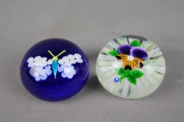 Two John Deacons paperweights, a millefiori 'Butterfly' example (6.