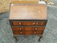 A fall front writing bureau with pigeon hole interior, approximately 102 cm 74 cm x 48 cm.