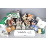 A quantity of Department 56 Heritage Village Collection ornaments,