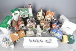 A quantity of Department 56 Heritage Village Collection ornaments,