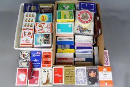 A large quantity of vintage playing cards.