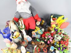 A collection of traditional Christmas and Easter decorations.