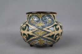 Doulton Lambeth - A small, squat stoneware vase decorated by Minnie G Thompson with foliate scrolls,