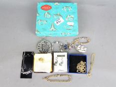 9ct gold - a box containing a quantity of costume to include paired earrings, brooches,