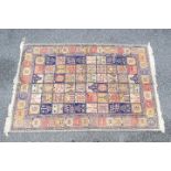 A good quality silk carpet measuring approximately 149 cm x 230 cm.