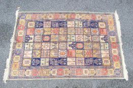 A good quality silk carpet measuring approximately 149 cm x 230 cm.