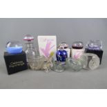 A collection of paperweights to include Perthshire glass,
