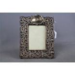 An Art Nouveau silver and leather, easel back photograph frame,