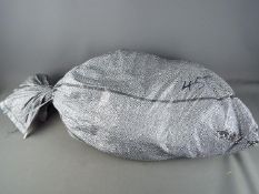 Costume Jewellery - A sealed sack containing approximately 26 Kg of unsorted costume jewellery.