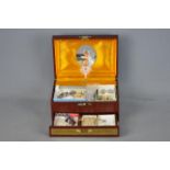 9 ct Gold - a jewellery box containing a pair of 9ct gold stone set earrings, stamped 9ct,