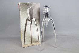 Philippe Starcke for Alessi, a Juicy Salif aluminium citrus squeezer, contained in original box.