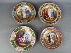 A group of three 19th century Vienna-style cabinet plates decorated with classical maidens,
