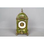 An interesting early 20th century mantel aneroid barometer, open dial mechanism,