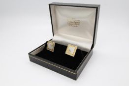 David M Robinson - a pair of David M Robinson cufflinks in original box