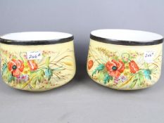 A matched pair of Victorian jardinieres hand painted in a floral design, 15 cm (h) x 20.