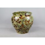 Doulton Lambeth - A stoneware jardiniere in the 'Autumn Leaves' pattern,