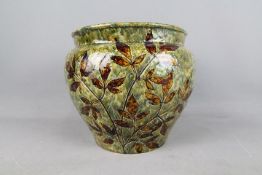 Doulton Lambeth - A stoneware jardiniere in the 'Autumn Leaves' pattern,