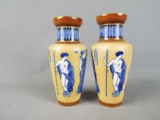 A pair of Doulton Burslem vases decorated with classical figures c.1900, approximately 16 cm (h).