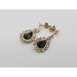 9ct gold - a pair of 9ct gold stone set earrings with butterfly clasps,