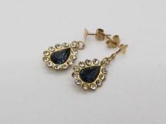 9ct gold - a pair of 9ct gold stone set earrings with butterfly clasps,