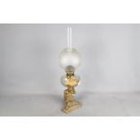 A good quality oil lamp, the support column in the form of a bear holding the oil font,