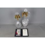 Two good quality crystal Decanters comprising one by Thomas Webb issued to commemorate the Queen's