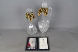 Two good quality crystal Decanters comprising one by Thomas Webb issued to commemorate the Queen's