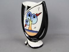 Lorna Bailey - an unusual twin-handled vase decorated in the Bursley Way pattern, 23 cm (high),