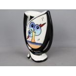 Lorna Bailey - an unusual twin-handled vase decorated in the Bursley Way pattern, 23 cm (high),