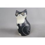 Rosemary Wren (1922 - 2013) - A cat figurine, impressed mark to the base, approximately 15 cm (h).