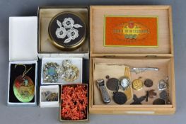 A Henri Wintermans cigar box containing a coral necklace with matching earrings, brooches,