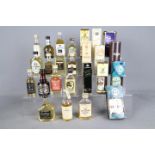 Twenty five whisky miniatures, predominantly Scotch to include Jura, Cardhu, Suntory Reserve,