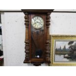 A late 19th / early 20th century Vienna style walnut cased wall clock,