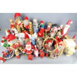 A collection of traditional Christmas decorations to include Swedish straw, ceramic,