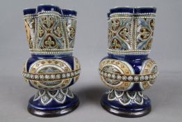 Doulton Lambeth - A pair of late 19th / early 20th century vases,