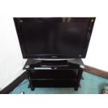 Panasonic - a 32 inch television set model TX-32L2D85 (Please Note - Glass display cabinet is not