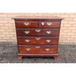 Chest of drawers - a George III mahogany chest of two over three drawers,