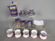 A pottery miniature coffee set and a quantity of Martinroda cups and saucers.